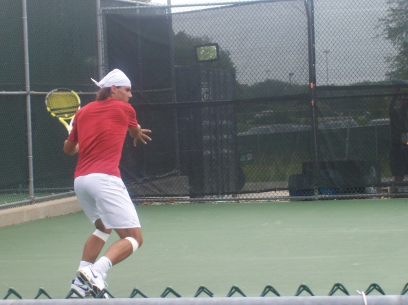 Nadal practicing a forehand. See the knee bands?